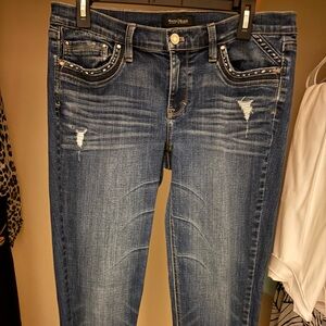 White House Black Market Blue Skinny Jeans fit more like a size 10